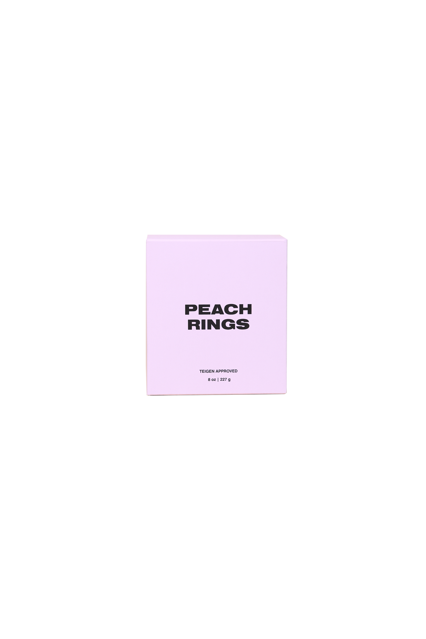 Cravings by Chrissy Teigen: Simmer Down Scented Candle in Peach Rings